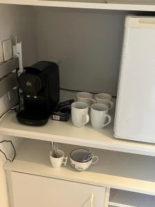 A kitchen or kitchenette at Silk and Stone Manor