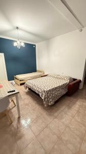 Ένα ή περισσότερα κρεβάτια σε δωμάτιο στο Loft Plaesano