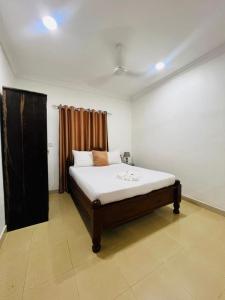 a bedroom with a bed in a room at Vuga Town House in Zanzibar City