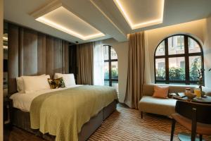 Ένα ή περισσότερα κρεβάτια σε δωμάτιο στο The Hobson Cambridge by Adina