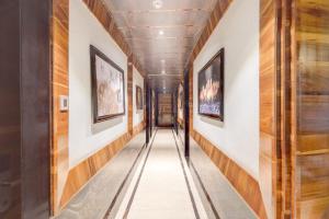 Μια τηλεόραση ή/και κέντρο ψυχαγωγίας στο Townhouse Oak CSJMU Kanpur Formerly Shree Dev Villa