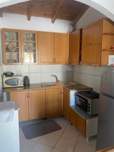 Kuchyň nebo kuchyňský kout v ubytování Rosemary House + 48 fotografií