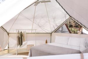 En eller flere senge i et værelse på wecamp L'Escala Punta Milà