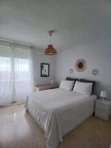 En eller flere senge i et værelse på El nido del mar + 14 billeder