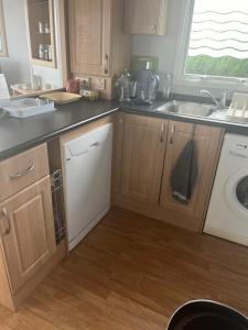 Η κουζίνα ή μικρή κουζίνα στο Mobilhome de Lucie et Julien