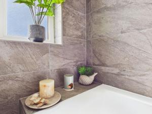 Ένα μπάνιο στο The Haven Holiday Home +25 φωτογραφίες