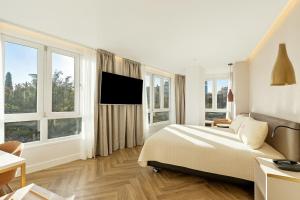 TV a/nebo společenská místnost v ubytování Sercotel HMO Martina