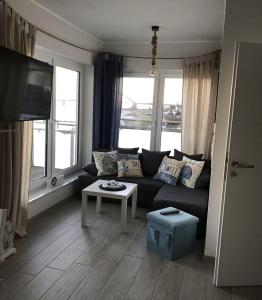 Posezení v ubytování Strandhaus-Appartment-Rauchschwalbe