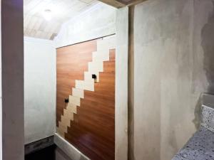 Φωτογραφία από το άλμπουμ του Amore Guesthouse Syariah Mitra RedDoorz σε Garung