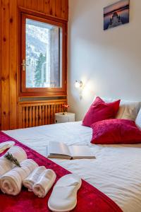 Ένα ή περισσότερα κρεβάτια σε δωμάτιο στο Monte Rosa Ski Apartment