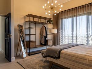 Ένα ή περισσότερα κρεβάτια σε δωμάτιο στο Villa and Studio Eiland