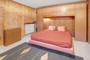 Ένα ή περισσότερα κρεβάτια σε δωμάτιο στο Appartamento vicino a Bormio