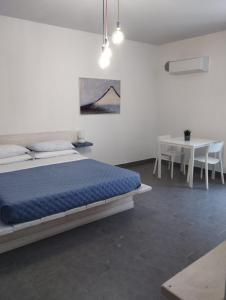 Ένα ή περισσότερα κρεβάτια σε δωμάτιο στο B&B Casa Valentone