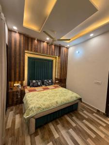 Ένα ή περισσότερα κρεβάτια σε δωμάτιο στο Lavish villa