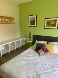 Ένα ή περισσότερα κρεβάτια σε δωμάτιο στο Chambre - Lis