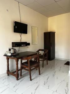 O bucătărie sau chicinetă la The Corbett Niyas