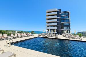Πισίνα στο ή κοντά στο Alezzi Odyssey Resort Aparthotel C68 Mamaia Nord