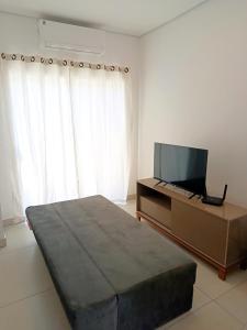 Et tv og/eller underholdning på Casa recém inaugurada, em condomínio, a 750 m do mar