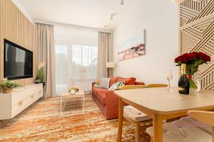 Телевизор и/или развлекательный центр в Your Holidays Bel Mare Aqua 537F