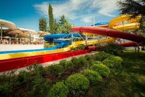 a water park with a colorful water slide at Hotel Garden Istra Plava Laguna in Umag