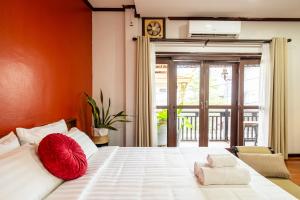 Ένα ή περισσότερα κρεβάτια σε δωμάτιο στο BlueHome