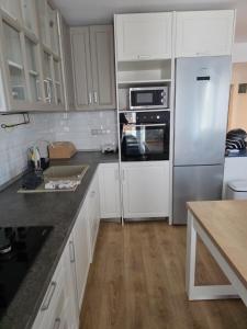 Η κουζίνα ή μικρή κουζίνα στο Apartament Blue Shark +1 φωτογραφίες