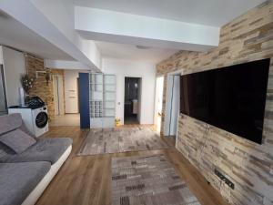 Μια τηλεόραση ή/και κέντρο ψυχαγωγίας στο Apartament Blue Shark