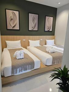 Ένα ή περισσότερα κρεβάτια σε δωμάτιο στο Riverla Villa