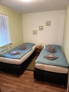 Postel nebo postele na pokoji v ubytování Ferienhaus Hüfler 59
