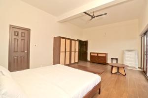 Ένα ή περισσότερα κρεβάτια σε δωμάτιο στο Villa Cirrus