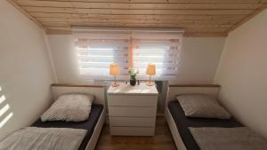 Postel nebo postele na pokoji v ubytování D1 - Klein aber fein