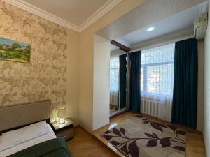 En eller flere senge i et værelse på Sahil apart