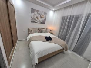 Ένα ή περισσότερα κρεβάτια σε δωμάτιο στο Modern apartment, 3 Pools, Panoramic View +87 φωτογραφίες