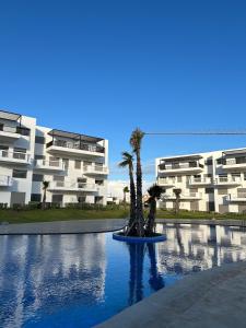 Πισίνα στο ή κοντά στο Modern apartment, 3 Pools, Panoramic View