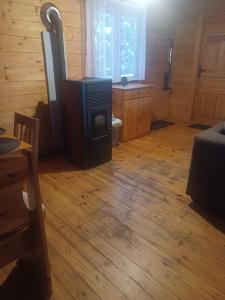 Χώρος καθιστικού στο Domek Mazury Max nad jeziorem w Rynie