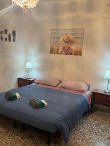 Una cama o camas en una habitación de Cleo Calla