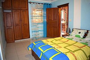 Ένα ή περισσότερα κρεβάτια σε δωμάτιο στο Elégance Residentielle