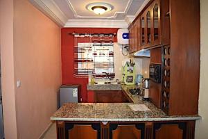 Η κουζίνα ή μικρή κουζίνα στο Elégance Residentielle