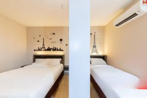 Postel nebo postele na pokoji v ubytování Sunlight Hotel Kulai + 3 fotografie