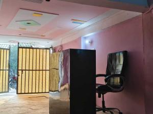 Μια τηλεόραση ή/και κέντρο ψυχαγωγίας στο SPOT ON Om Hotel & Restorent