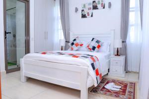 Ένα ή περισσότερα κρεβάτια σε δωμάτιο στο Vipingo ridge