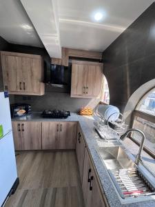 Kuchyň nebo kuchyňský kout v ubytování Morbex Inn Hotel Islamabad