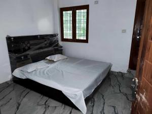 Ένα ή περισσότερα κρεβάτια σε δωμάτιο στο Hotel O Easy stay