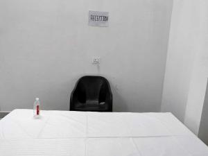 Ένα ή περισσότερα κρεβάτια σε δωμάτιο στο Hotel O Easy stay