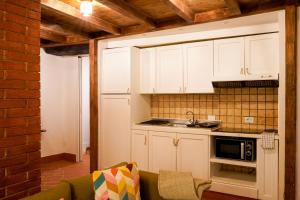 Η κουζίνα ή μικρή κουζίνα στο Romantic Nest