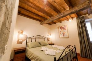 Ένα ή περισσότερα κρεβάτια σε δωμάτιο στο Romantic Nest