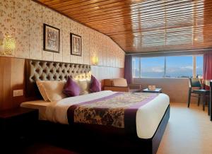 Ένα ή περισσότερα κρεβάτια σε δωμάτιο στο Mount Thistle Boutique Hotel