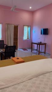 Μια τηλεόραση ή/και κέντρο ψυχαγωγίας στο Haven Nest Homestay