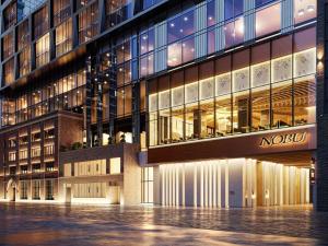 ein Gebäude mit einem Nokia-Schild auf der Seite in der Unterkunft Nobu Hotel Toronto in Toronto