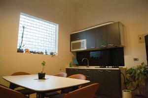 Η κουζίνα ή μικρή κουζίνα στο 午木Wunu民宿 +10 φωτογραφίες